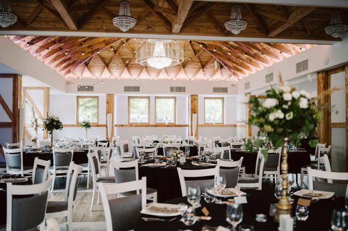 The Kryształowa hall laid for a reception, under the 1926 timber ceiling