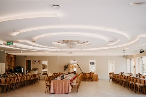 The Tarasowa hall with long tables set in a horseshoe